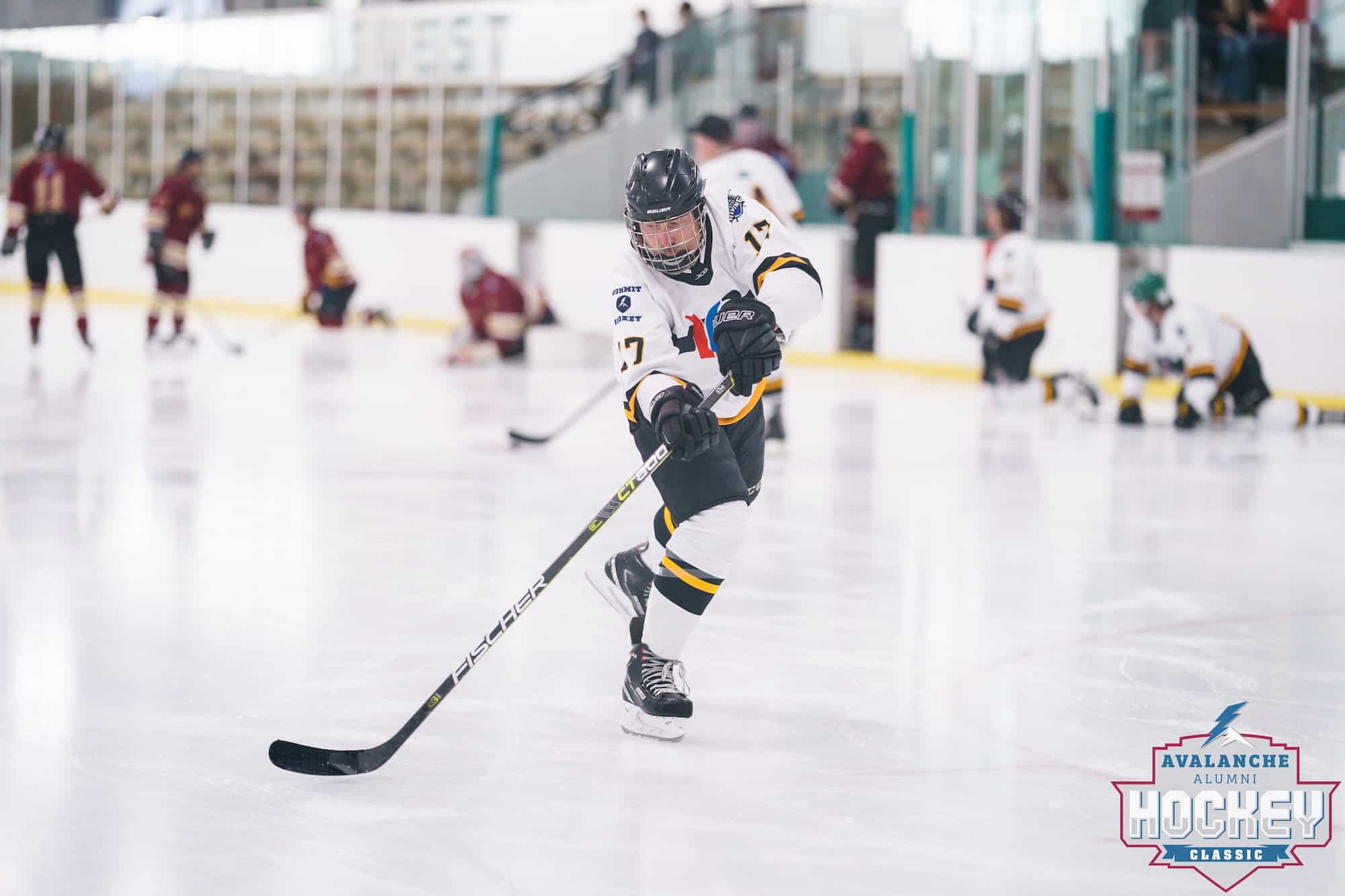 Photo of Dr. Cutler playing hockey